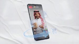 هاتف يعرض بث مباشر (Live) مع ظهور أيقونات منتجات وسعر، وسهم يخرج من الهاتف باتجاه سلة مشتريات "فطين".